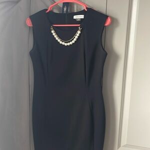 Calvin Klein business dress with jewelry attached